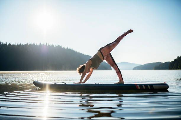 istockphoto-1452788822-612x612-1 Why Stand Up Paddle board Yoga is the Ultimate Fitness Trend of 2024